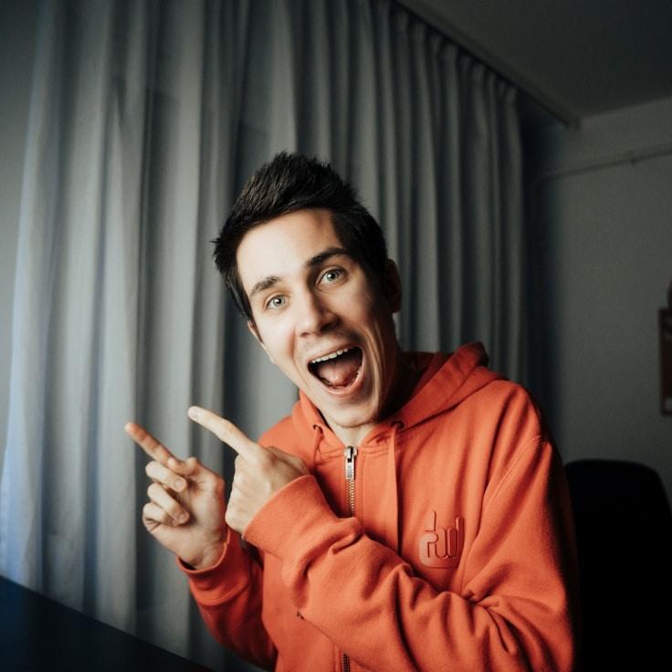 Kaveri Mehta, Lead Design Curator at PaperCalendarZenith, reviewing corporate floral arrangements